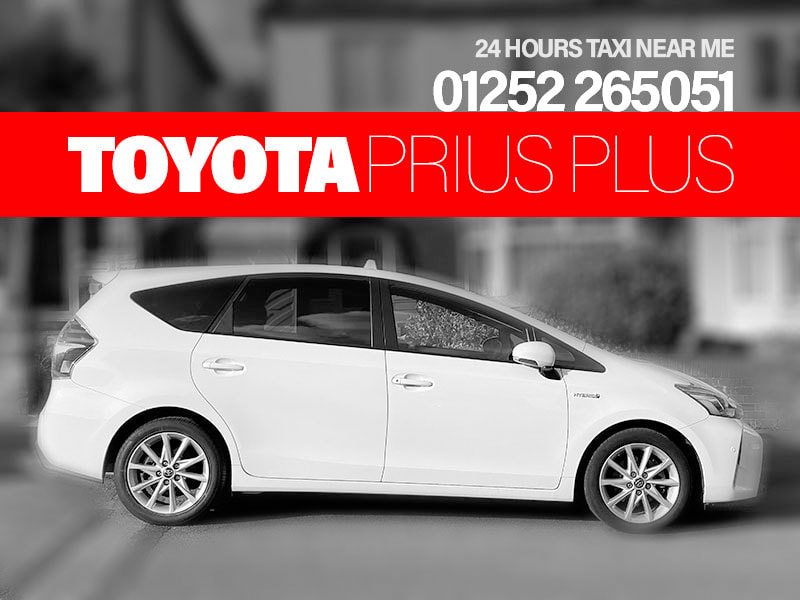 A 4 seater white Toyota Prius Plus ☎️01252 265051 phone number, 24 hours taxi near me