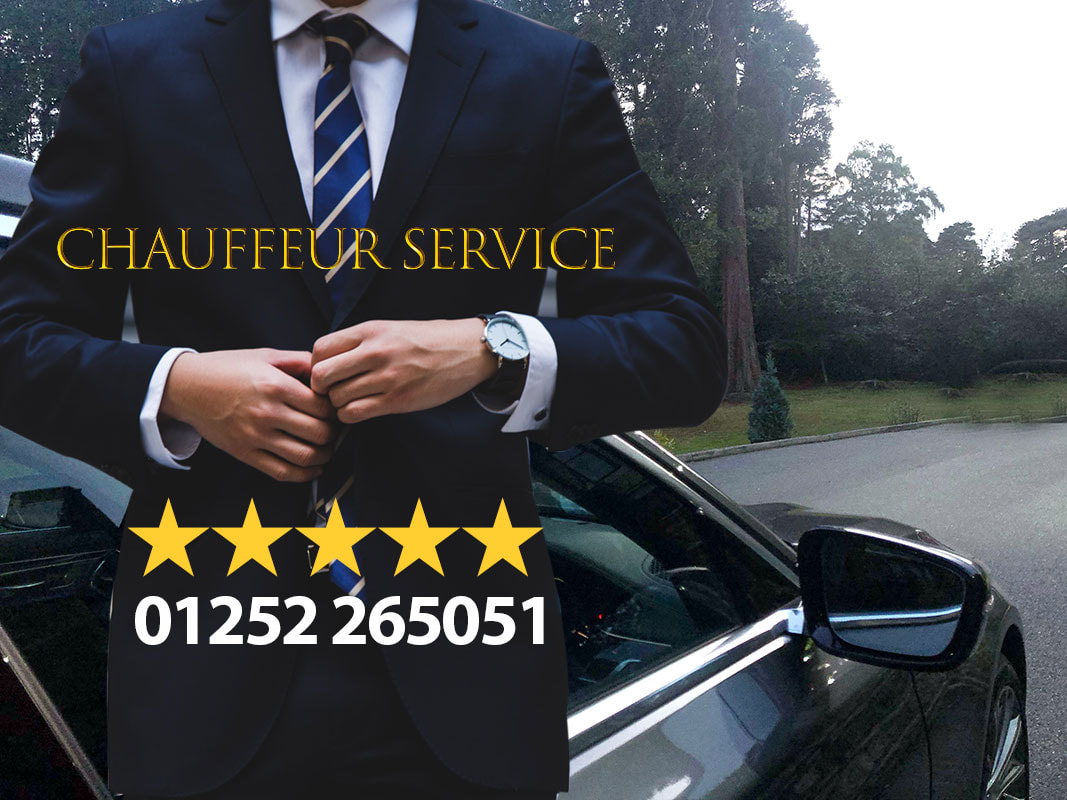 Chauffeur standing in front of a luxury BMW 7 series executive car inside McDonald Frimley Hall Hotel in Camberley, Surrey.  Chauffeur service ⭐️⭐️⭐️⭐️⭐️☎️ 01252 265051☎️