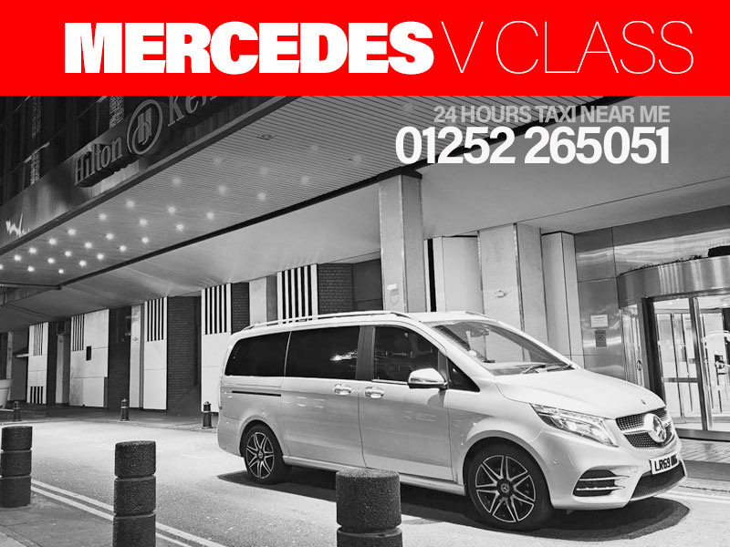 A silver Mercedes V class luxury 7 seater van, ☎️01252 265051 phone number, 24 hours taxi near me (in front of Kensington Hotel, London)